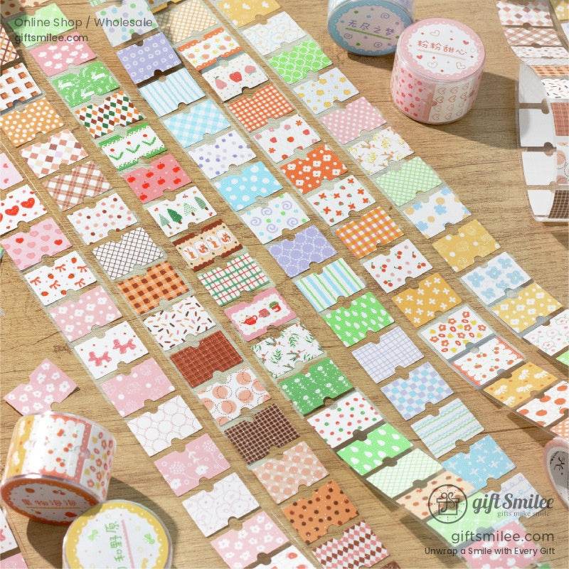 A variety of colorful washi tape patterns neatly displayed on a wooden surface, perfect for journaling or crafting