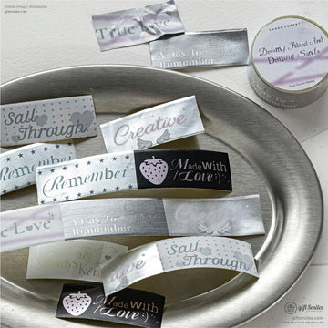 Pastel “Candy Poetry” washi tape set with inspirational phrases on metallic labels, styled on a silver tray for craft and gift wrapping.