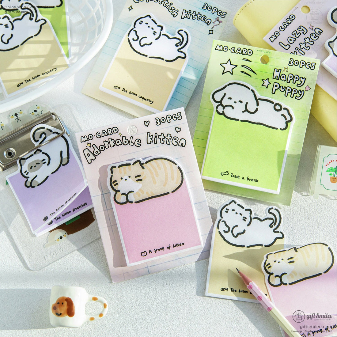 A pastel-colored set of sticky notes featuring adorable kitten and puppy designs, perfect for journaling and planners