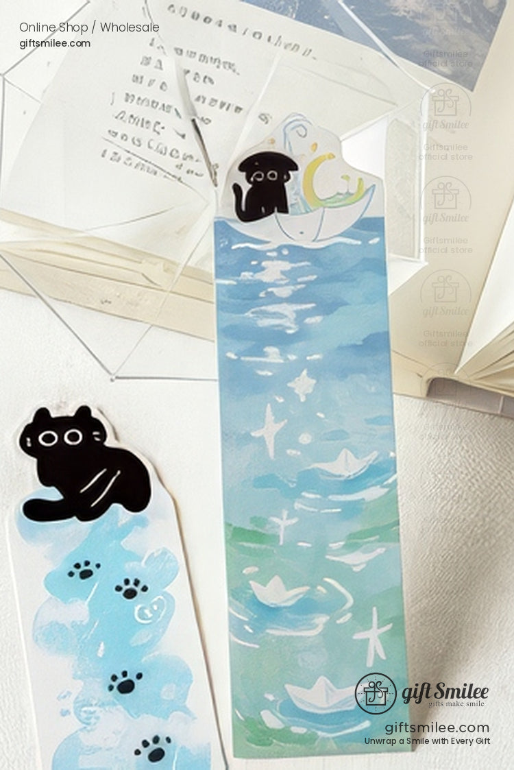 Cute black cat floral bookmarks on open book and blanket, pastel aesthetic stationery by giftsmilee.
