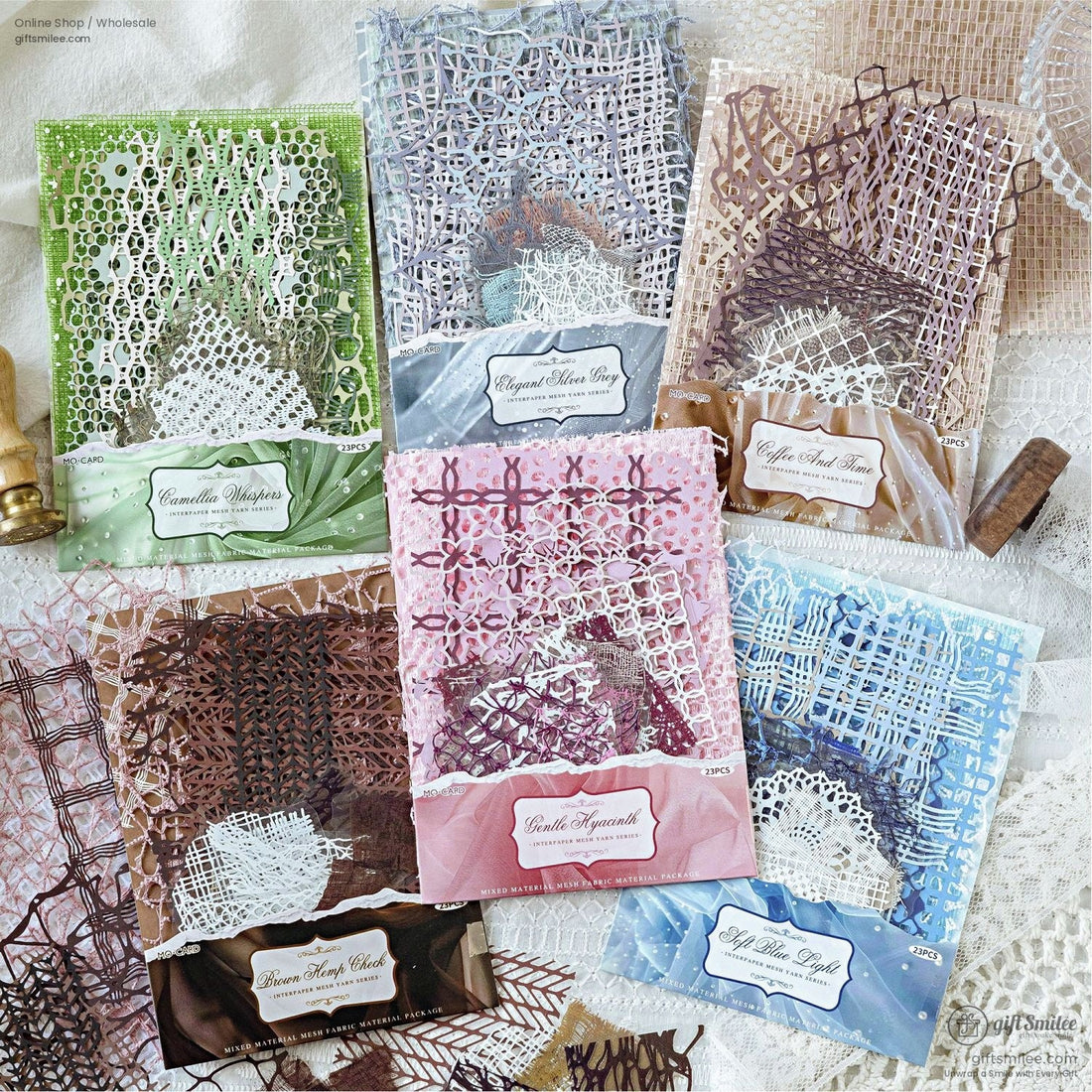 Variety of colorful mesh and lace textures spread out for crafting