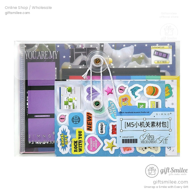 DIY scrapbook pop‑up card kit with stickers and paper templates laid out on a desk