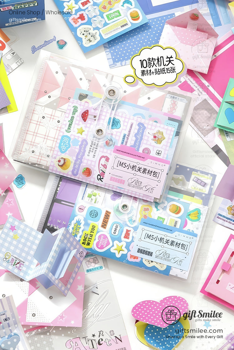 DIY scrapbook kit with pink mini photo frame and pop-up envelopes being assembled  