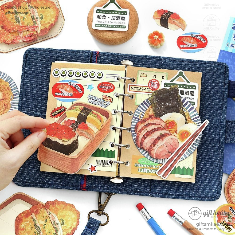 Japanese food-themed scrapbook stickers set displayed in a planner, ramen and sushi designs