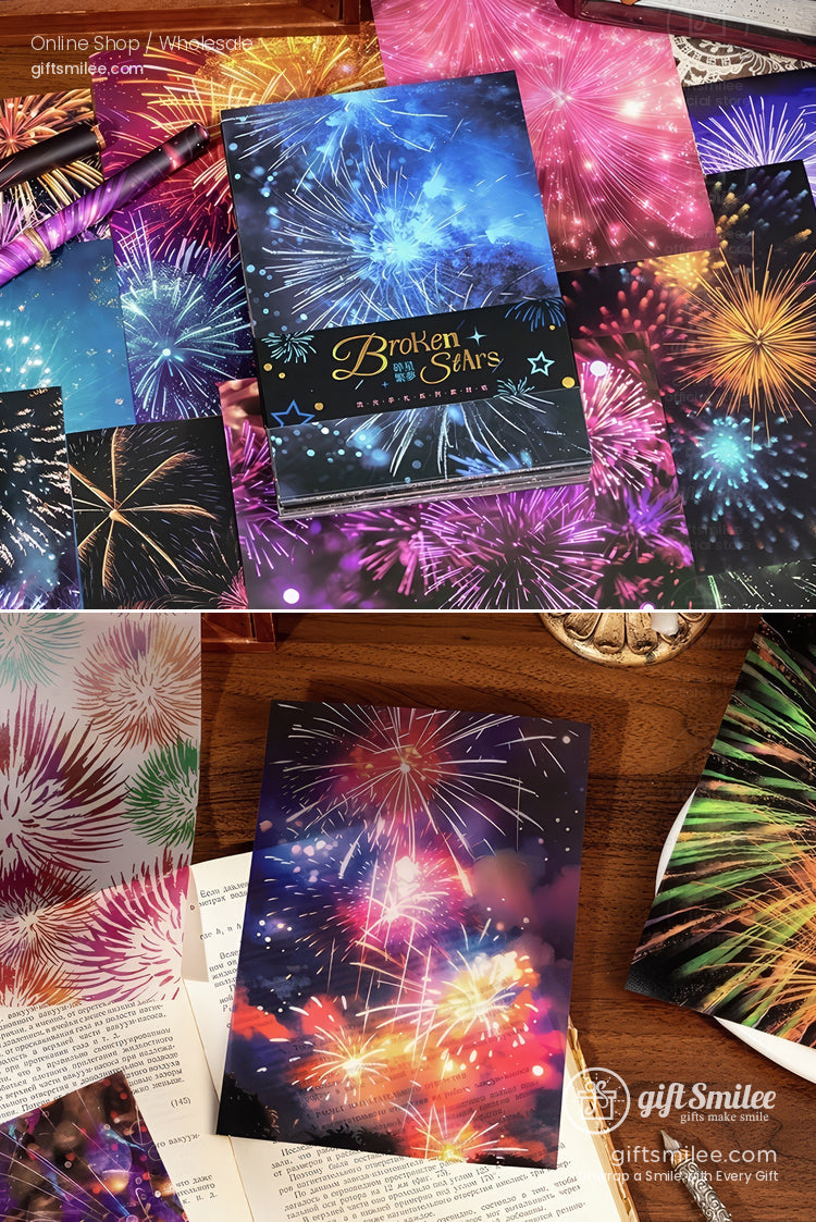 Fireworks-themed stationery set with colorful postcard designs on a wooden desk  