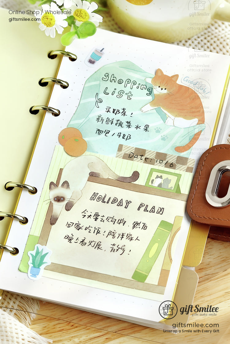 Pastelthemed planner page with cat illustrations handwritten notes leather binder and small daisy accents