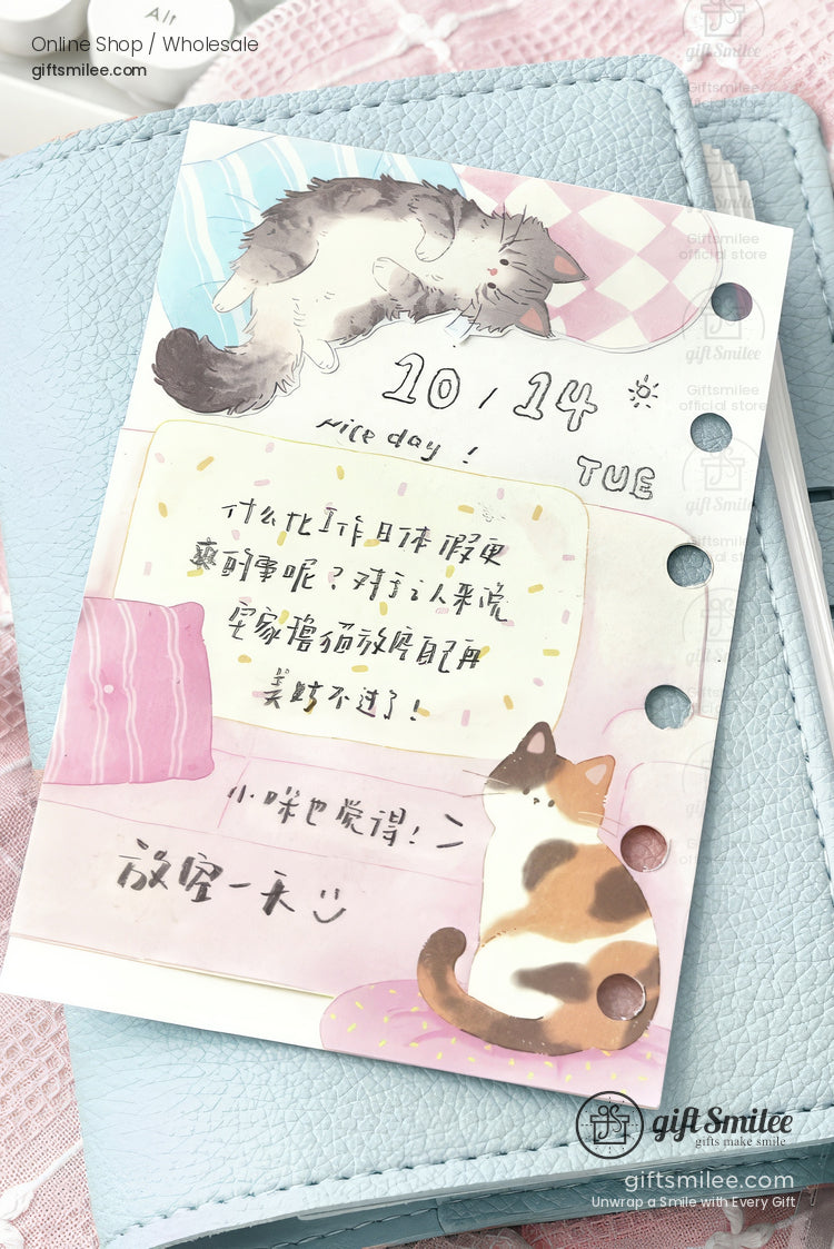 Pastelthemed planner page with cute cat illustrations handwritten notes punched holes and soft pink and blue accents