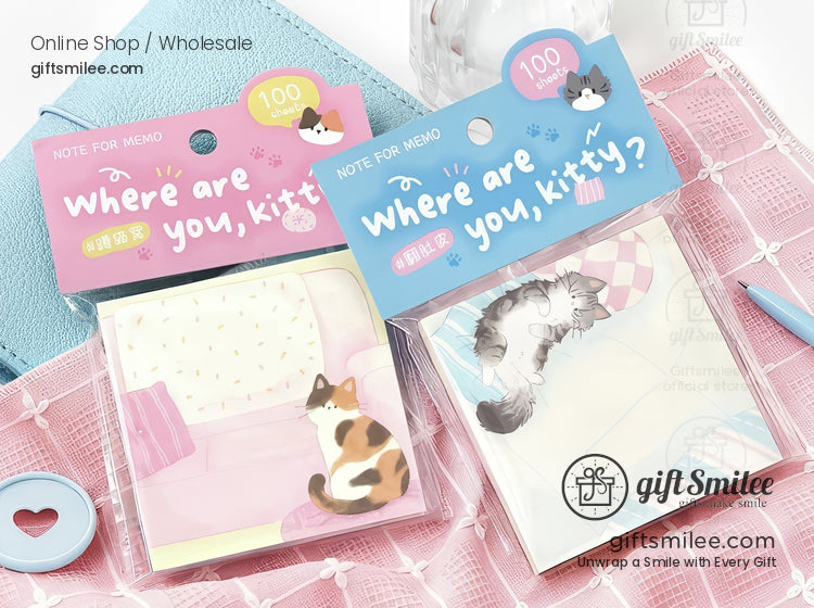Pastel catthemed sticky notes with playful designs featuring calico and tabby cats on pink and blue backgrounds