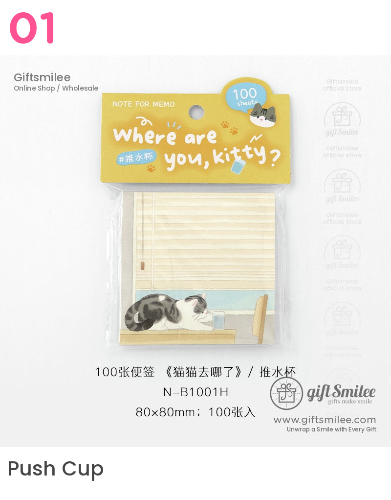 Yellow memo pad packaging with playful Where are you kitty text 100 sheets cat illustration on desk near blinds