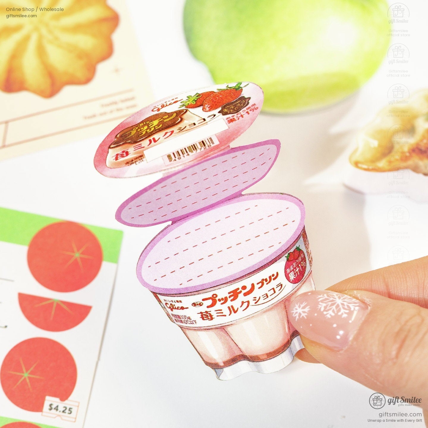 Mini strawberry puddingthemed notepad with pink dotted pages vibrant packaging design and a compact whimsical style