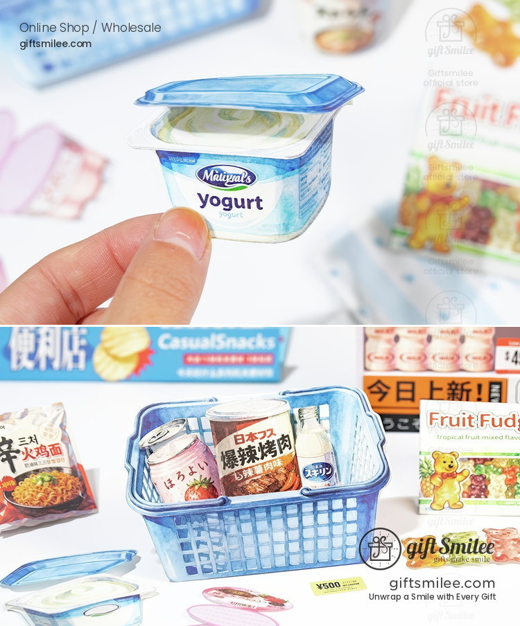 Miniature blue yogurt container with realistic text a plastic basket holding small canned drinks snacks and fruit gummies