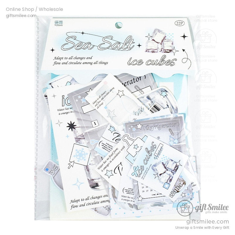 Minimalist stationery set with icy blue and clear ice cubethemed designs featuring star motifs and elegant typography
