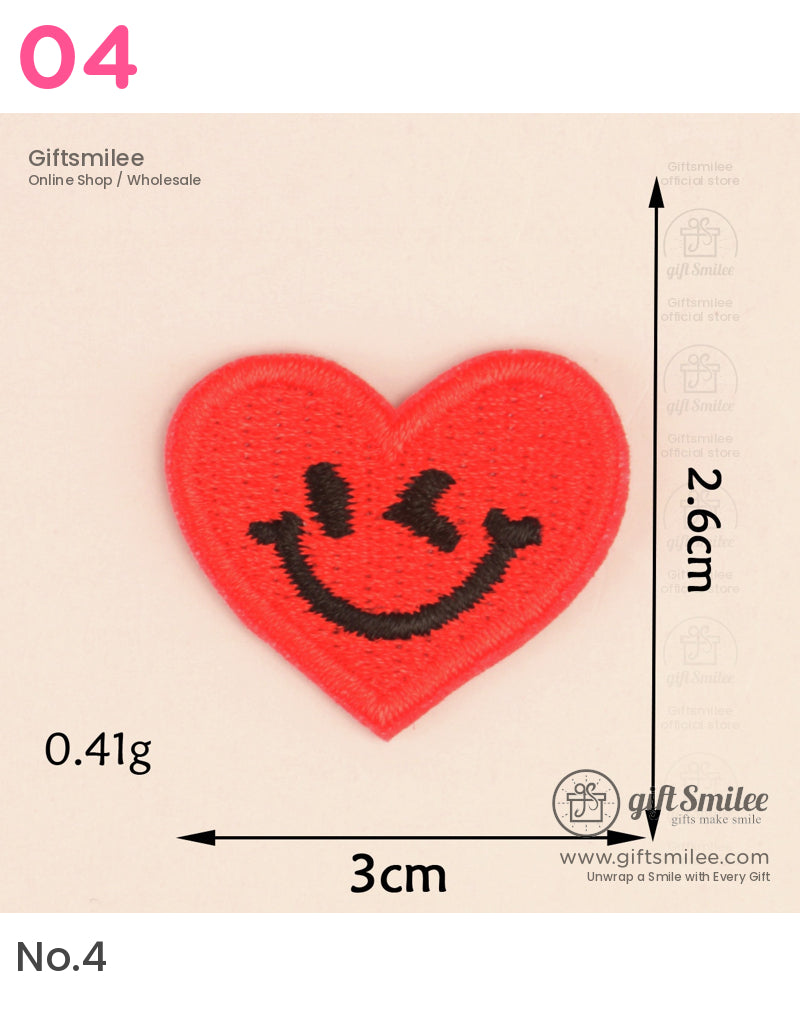 Bright red embroidered heart patch with black smiling face lightweight and compact at 3cm by 26cm