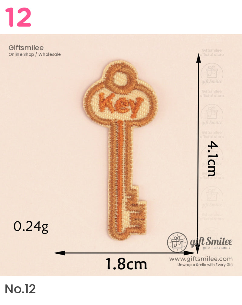 Tan embroidered keyshaped patch with Key text lightweight design 41cm tall decorative stitching details