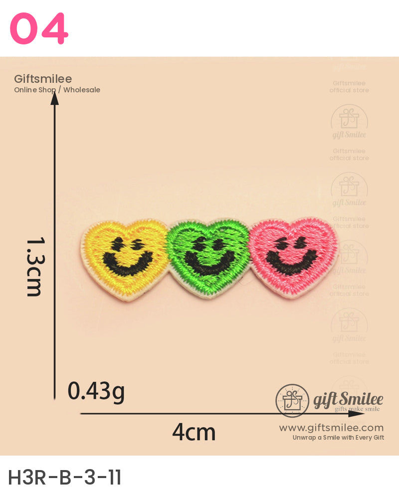 Colorful embroidered heart patches in yellow green and pink with black smiling faces small and lightweight