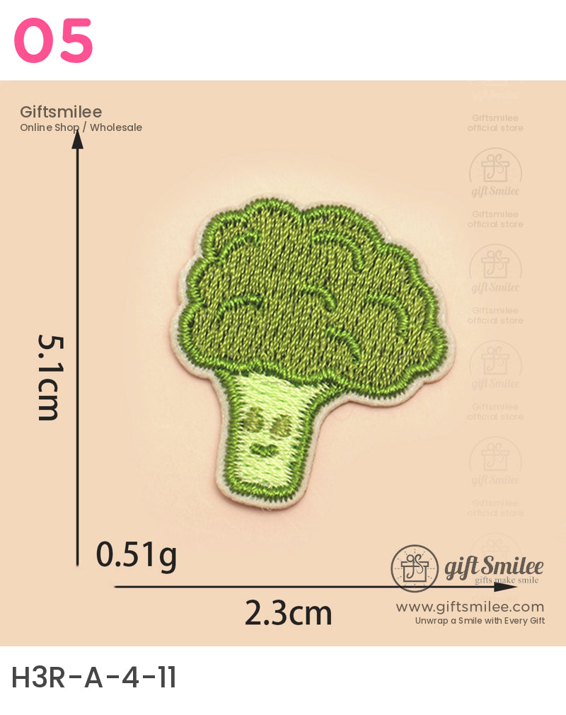 Green embroidered broccoli patch with smiling face 51x23 cm lightweight fabric design on beige background