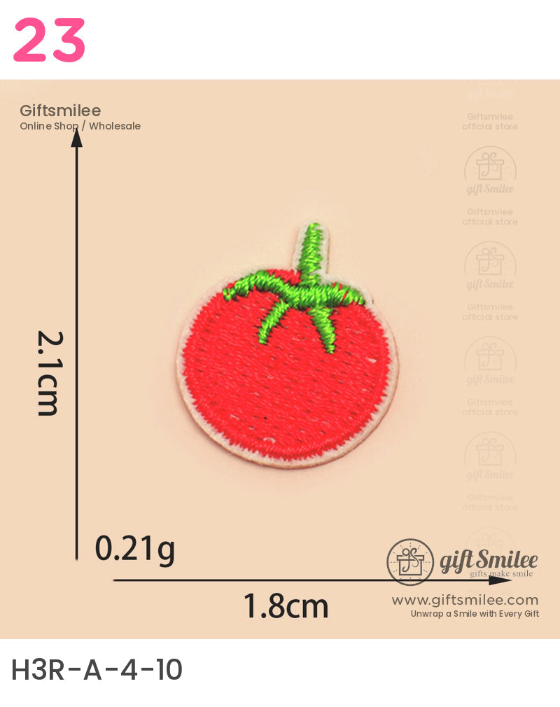 Small red tomato patch with green embroidered stem round shape lightweight fabric measuring 21cm by 18cm