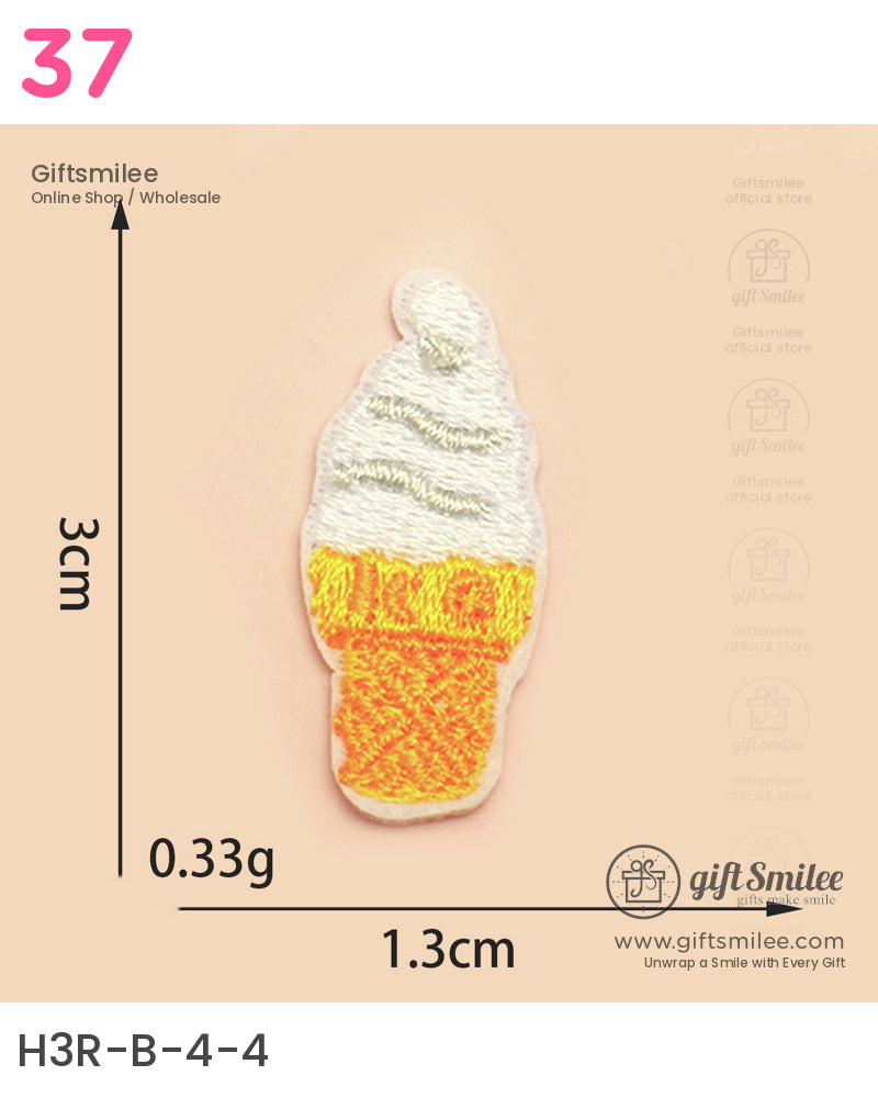 Mini embroidered ice cream patch with white swirl top orange cone and textured stitching on a beige background
