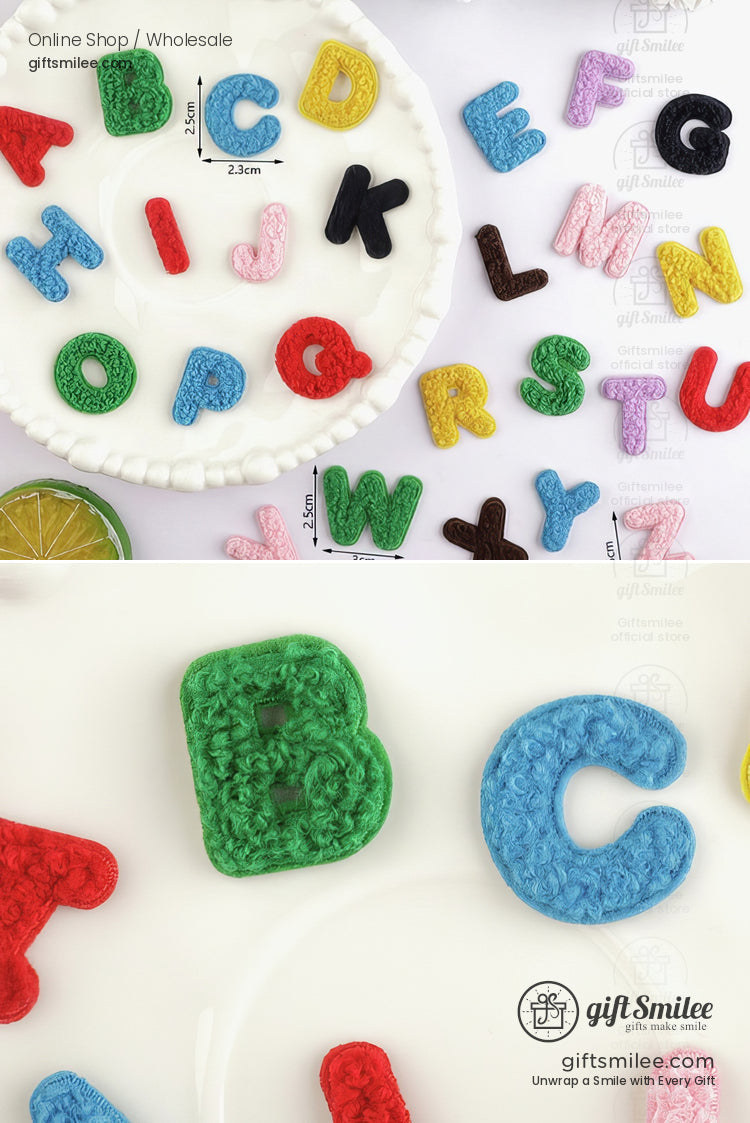 Colorful crocheted alphabet letters in vibrant red green blue yellow and pink on a white plate and background