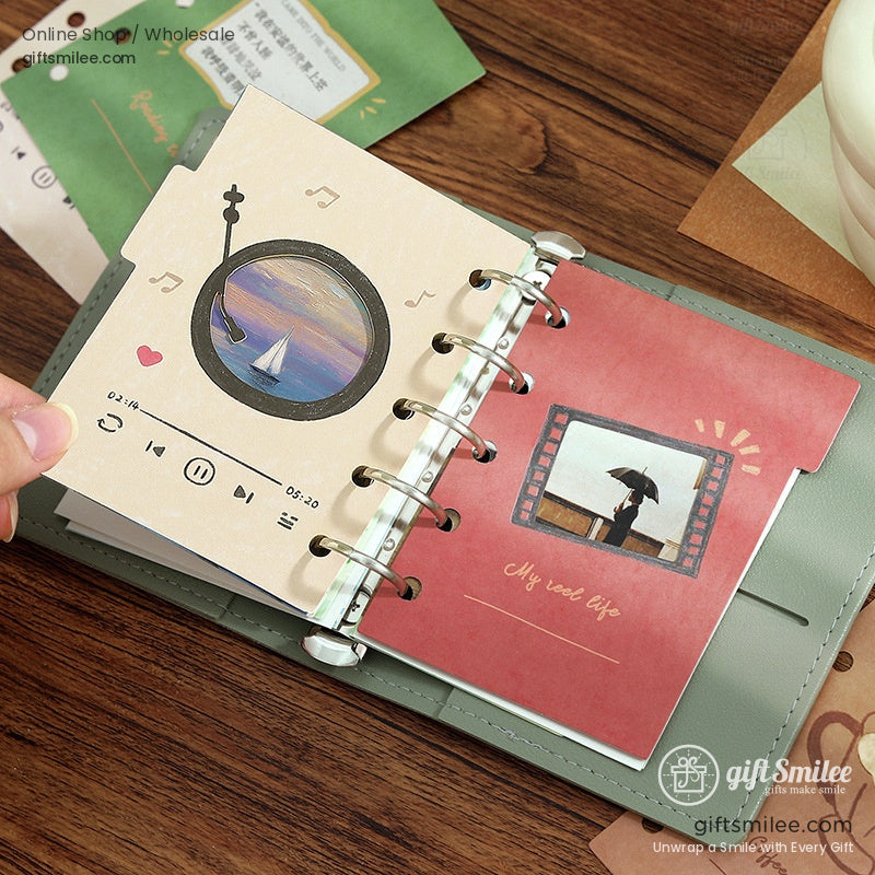 Pastel laser-cut planner dividers featuring swan and bird designs