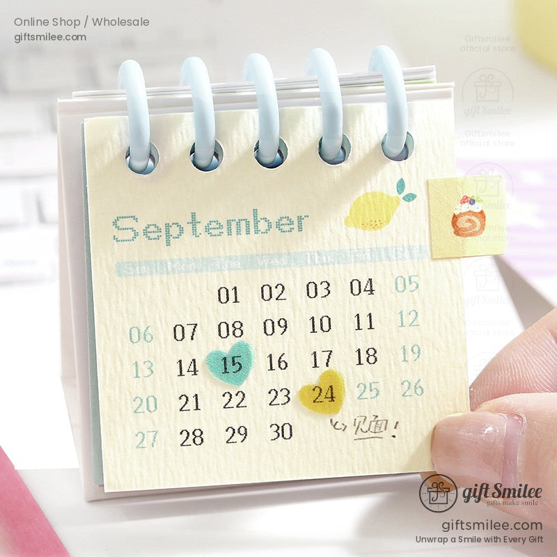 September 2025 mini calendar page with lemon and heart illustrations for desk setup