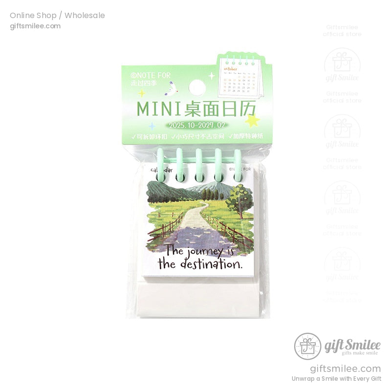 Mini spiral calendar with a scenic countryside design and motivational quote for 2025-2027