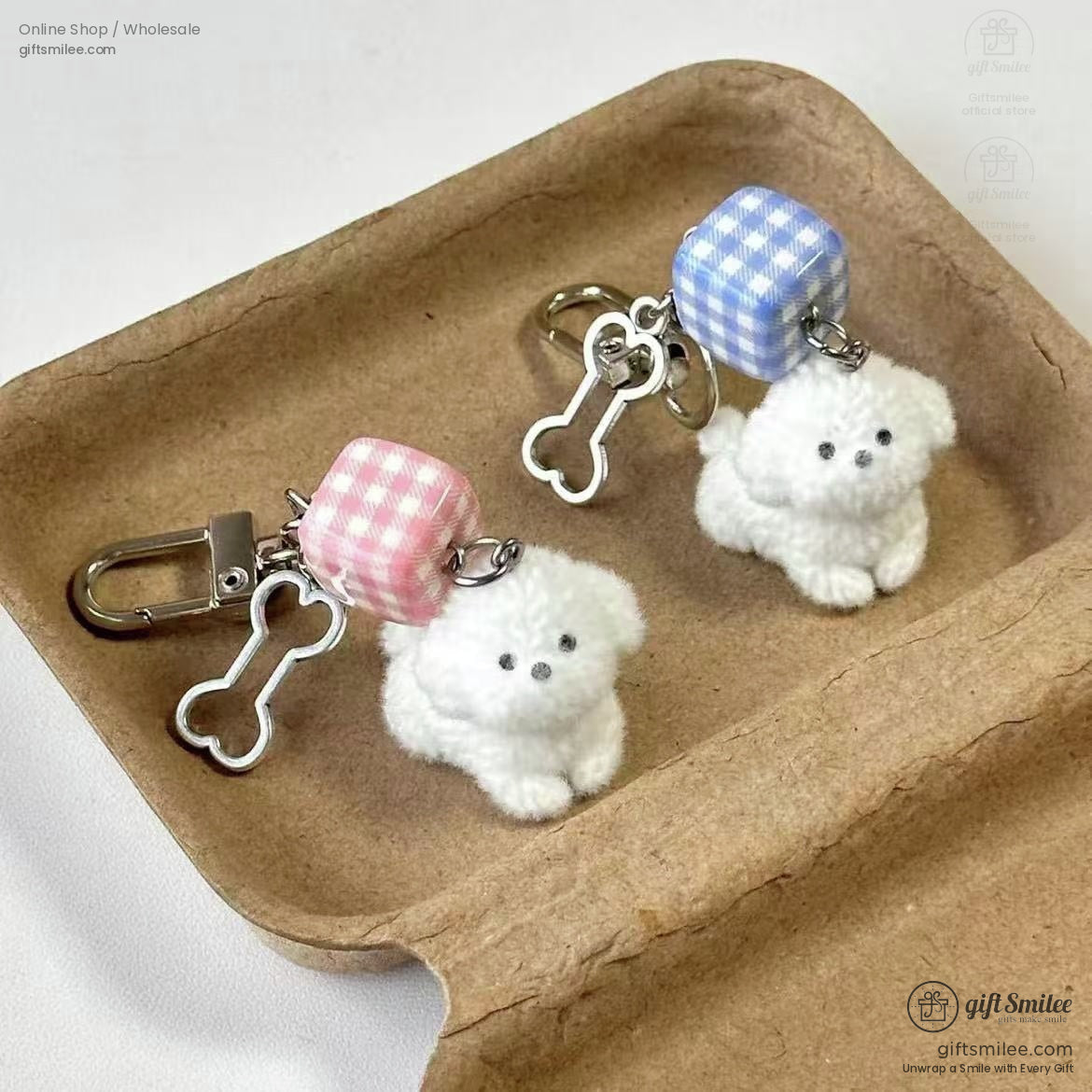Plush white dog keychains with pink and blue gingham cube charms silver bone accents and durable metal clasps