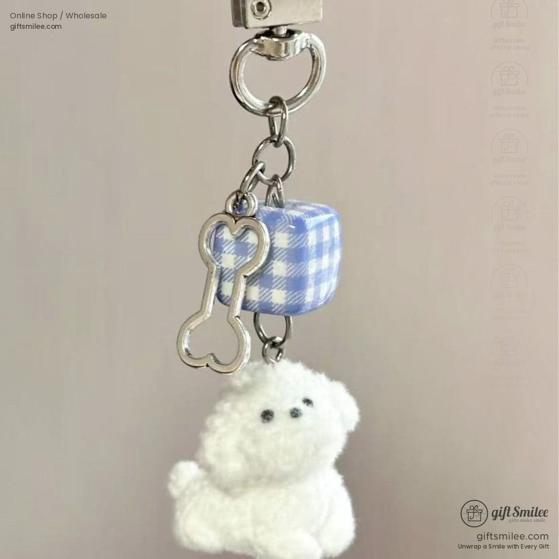 Plush white dog keychains with pink and blue gingham cube charms silver bone accents and durable metal clasps