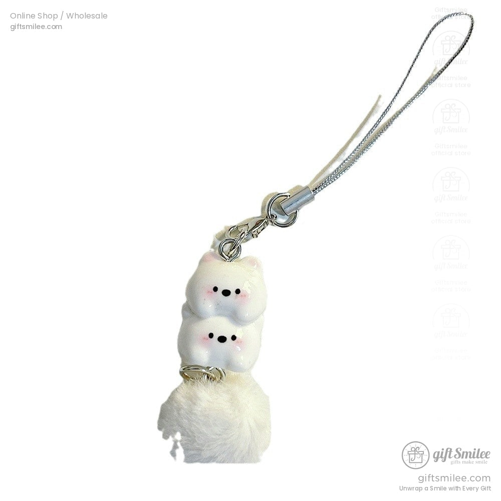 White ceramic twin bear charm with pink blush accents silver keychain clasp and soft faux fur pompom attachment