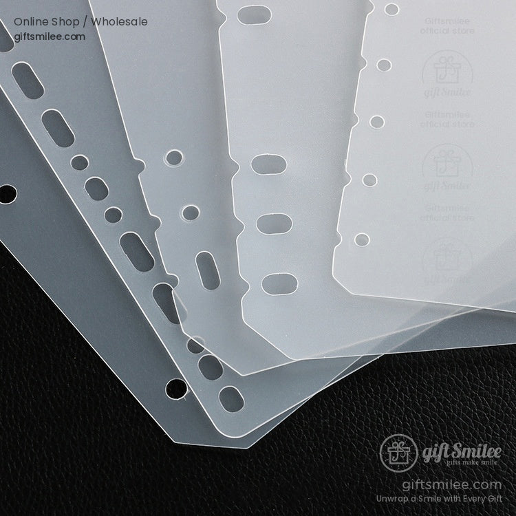 Transparent frosted plastic binder dividers in three sizes with prepunched holes on a pink background