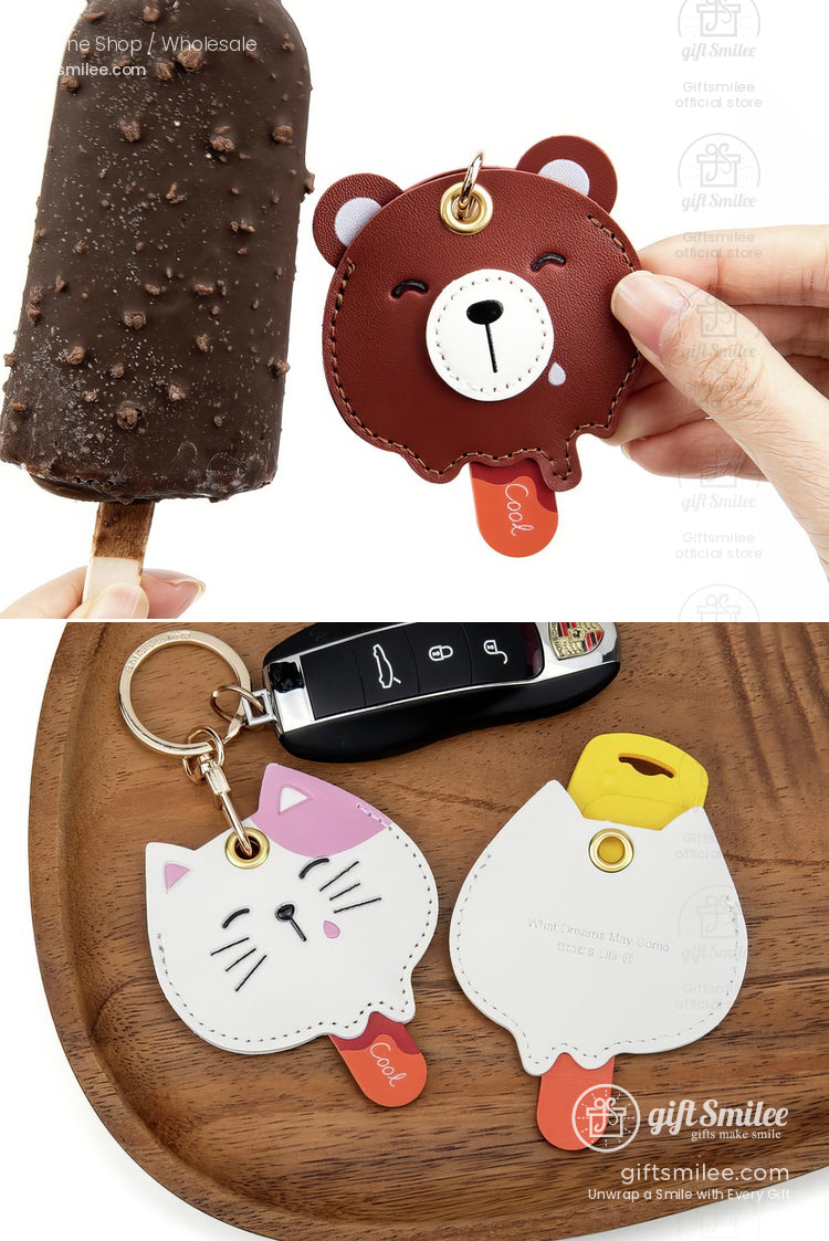 Brown bear white cat and yellow chick ice creamshaped leather keychains with gold accents and playful designs