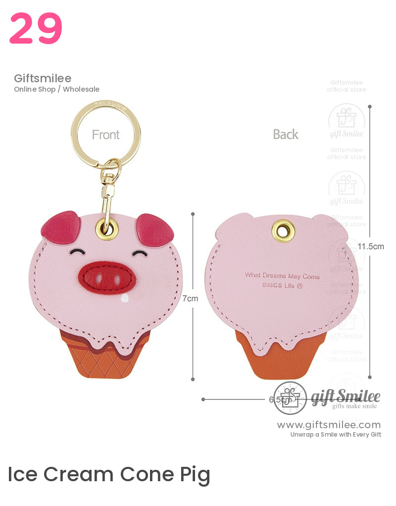 Pink pigshaped faux leather keychain with red accents coneshaped base gold ring and playful embossed details