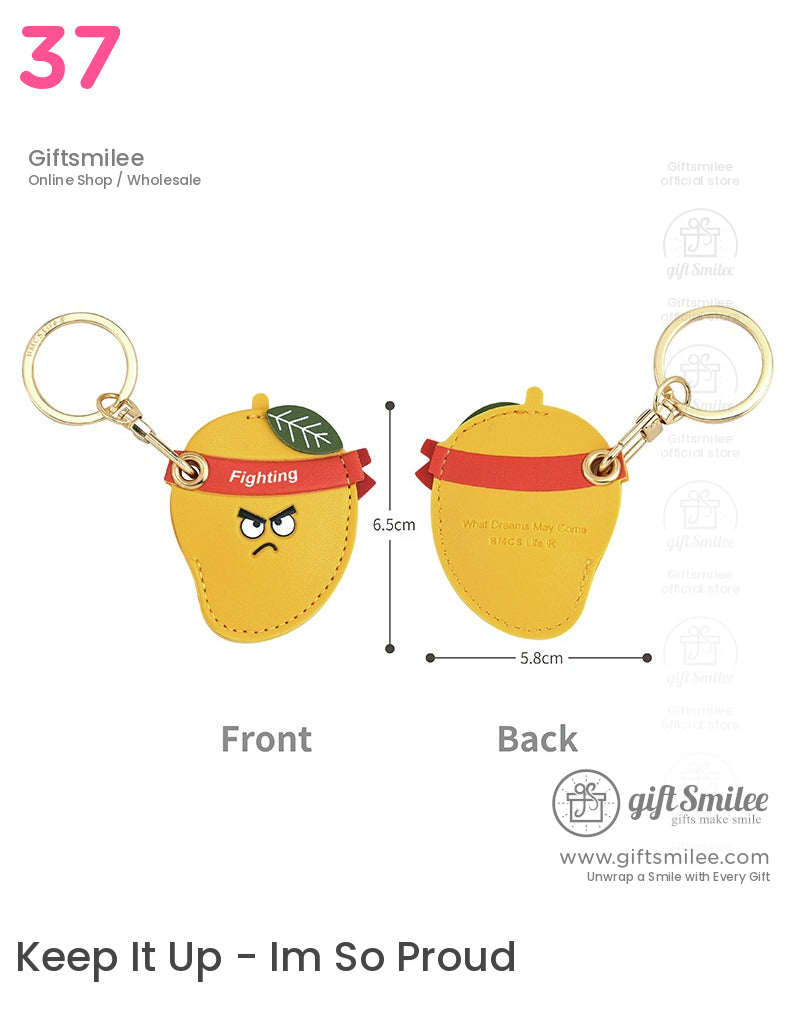Yellow mangoshaped keychain with red Fighting headband green leaf detail gold metal ring and precise dimensions