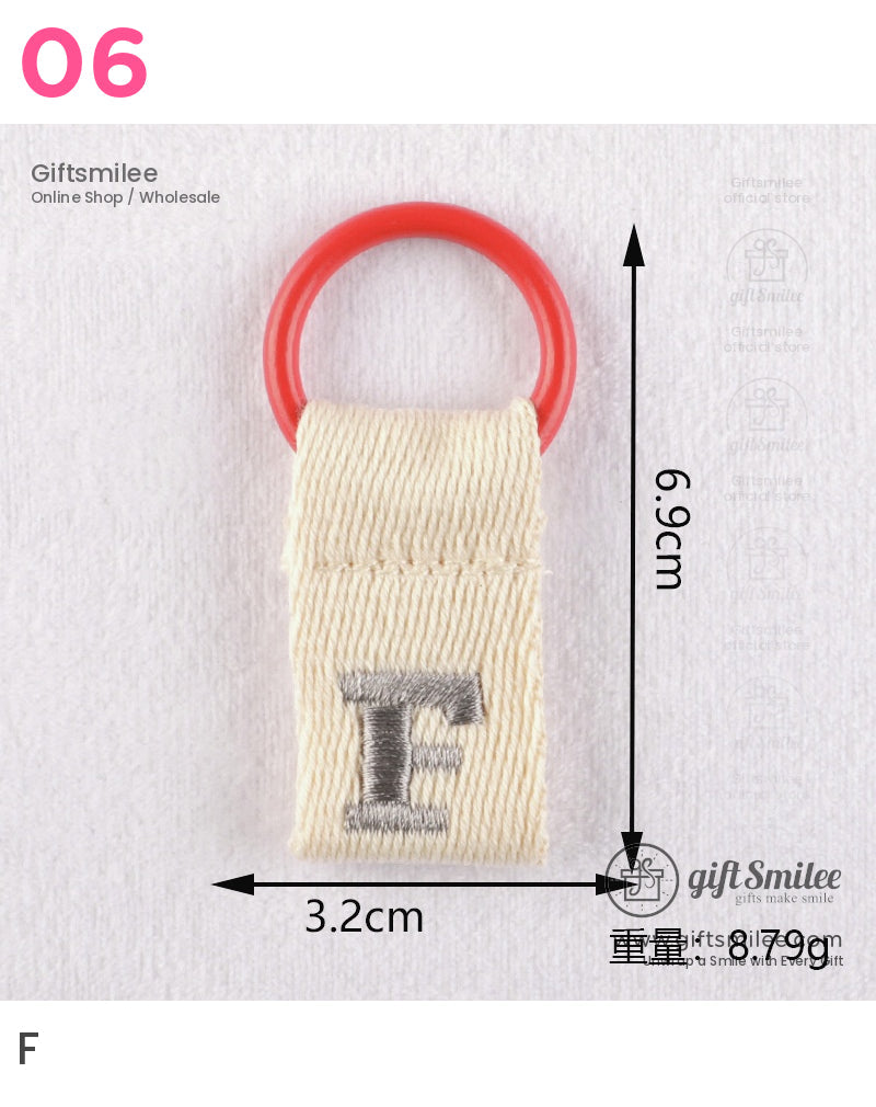 Beige cotton fabric keychain with embroidered gray F and red circular plastic ring 69x32cm lightweight design