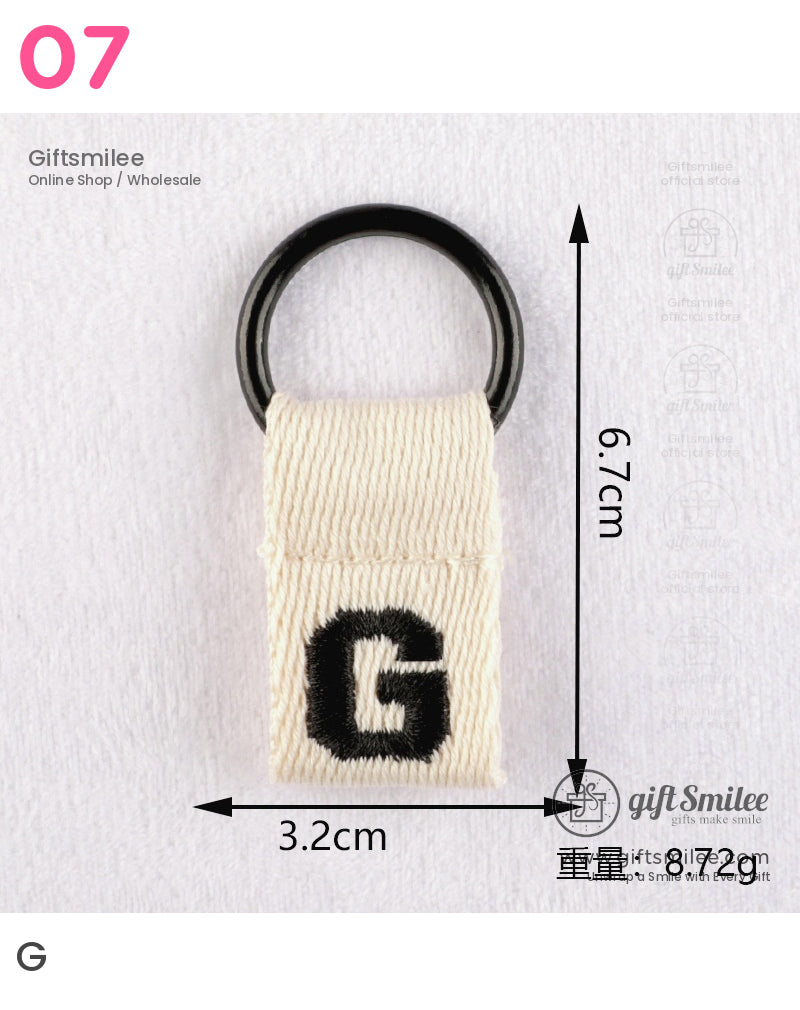 Beige cotton keychain loop with black G embroidery black metal ring measuring 67cm x 32cm lightweight design