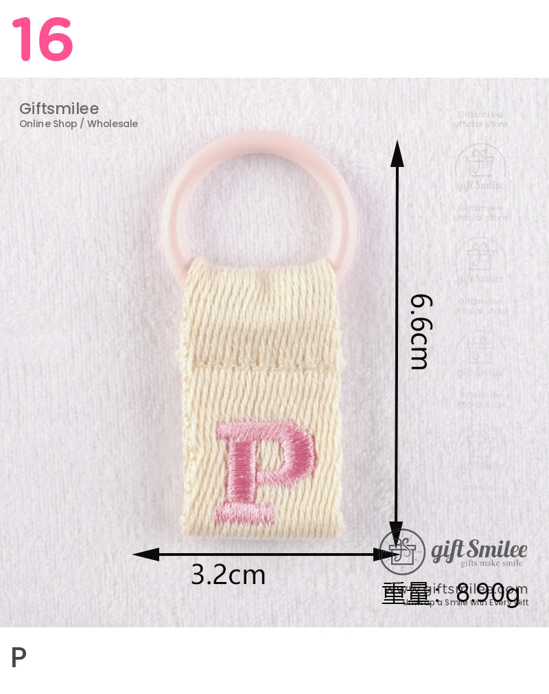 Beige cotton strap with pink embroidered P attached to a pastel pink plastic ring measuring 66cm x 32cm