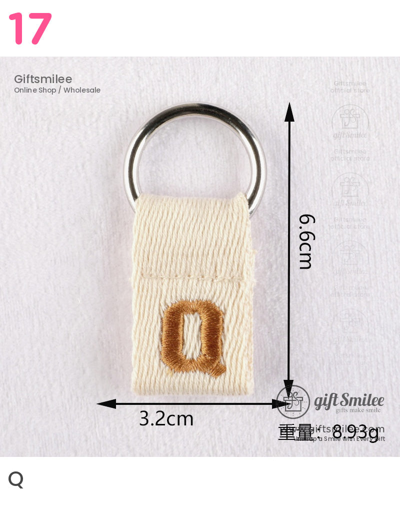 Beige cotton keychain loop with embroidered orange letter Q silver metal ring and precise size measurements