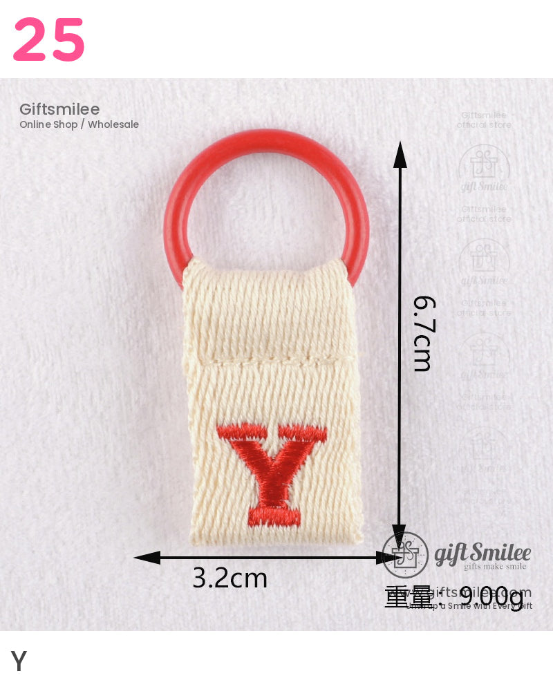 Beige cotton keychain with red embroidered Y and red plastic loop measuring 67 cm by 32 cm weighing 9 g