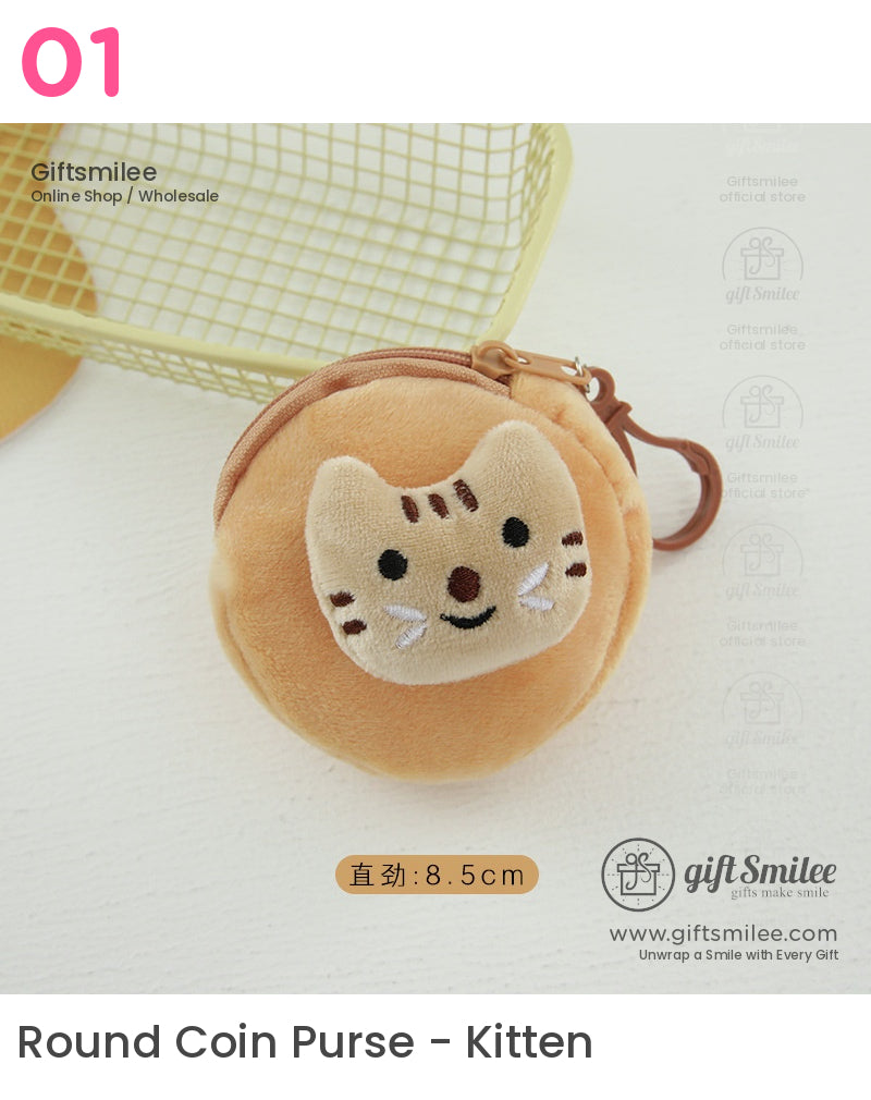 Round beige plush coin purse with embroidered cat face zipper closure and brown keyring attachment