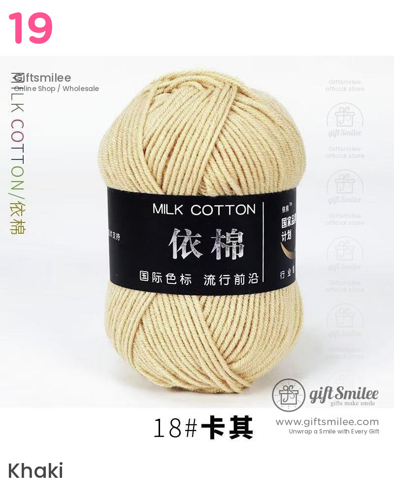 Soft creamcolored milk cotton yarn with smooth texture black label and Chinese characters ideal for knitting