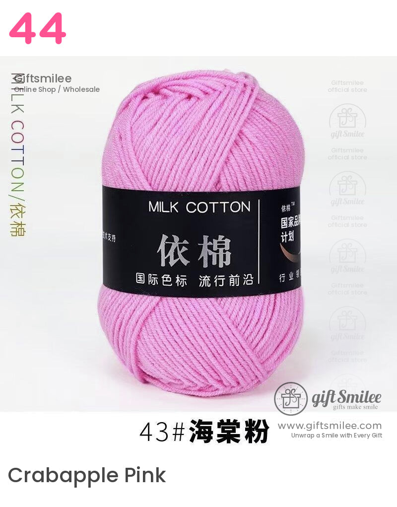 Soft pink milk cotton yarn with a smooth texture durable fiber and black label featuring Chinese characters