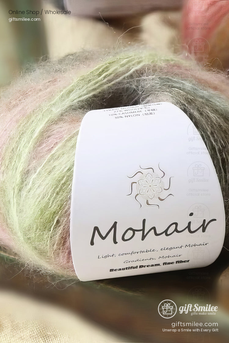 Soft brown and cream mohair yarn ball paired with striped knitted fabric and wooden knitting needles on a bamboo mat