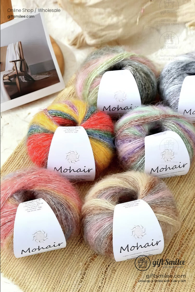 Soft mohair yarn skeins in pastel and vibrant multicolor blends ideal for knitting displayed on a beige textured surface