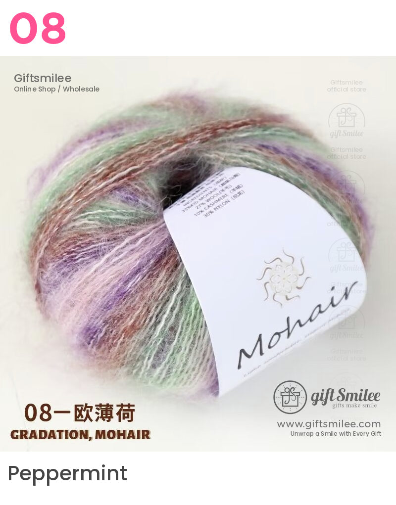 Soft gradient mohair yarn in pastel green lavender and peach hues with a white label for knitting or crocheting