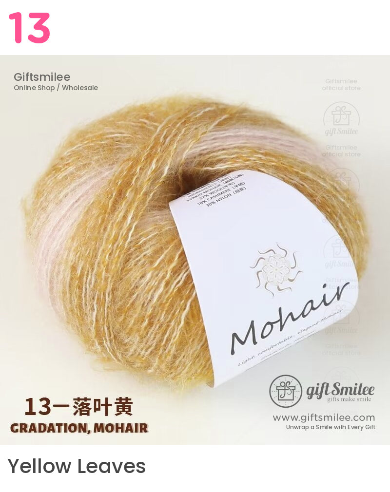 Goldenyellow mohair gradient yarn with soft pink accents lightweight and fluffy texture wrapped in labeled packaging