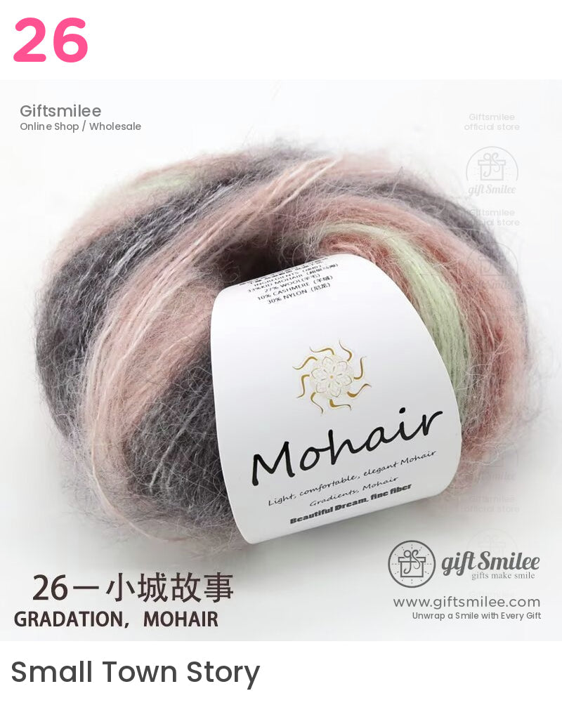 Gradient mohair yarn in soft pink mint green and charcoal tones featuring a fluffy texture and premium fiber blend