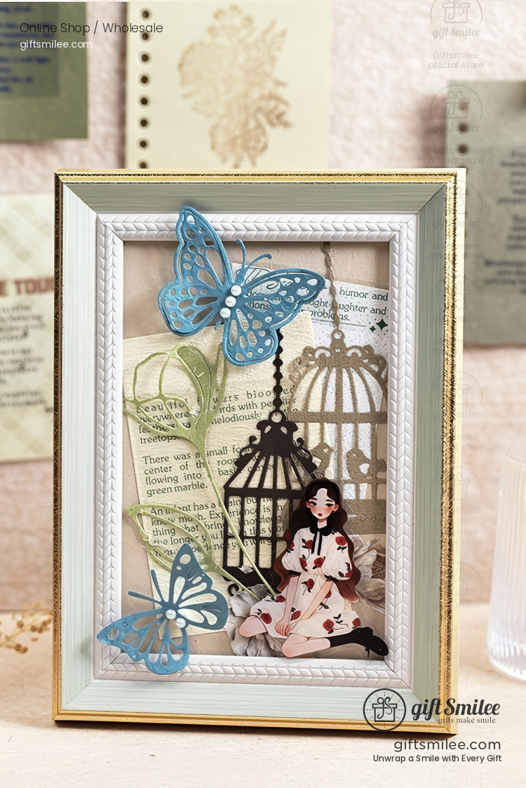Handmade 3D shadow box frame with blue butterflies, vintage birdcage cutouts, and a seated girl illustration – whimsical home decor gift from Giftsmilee.