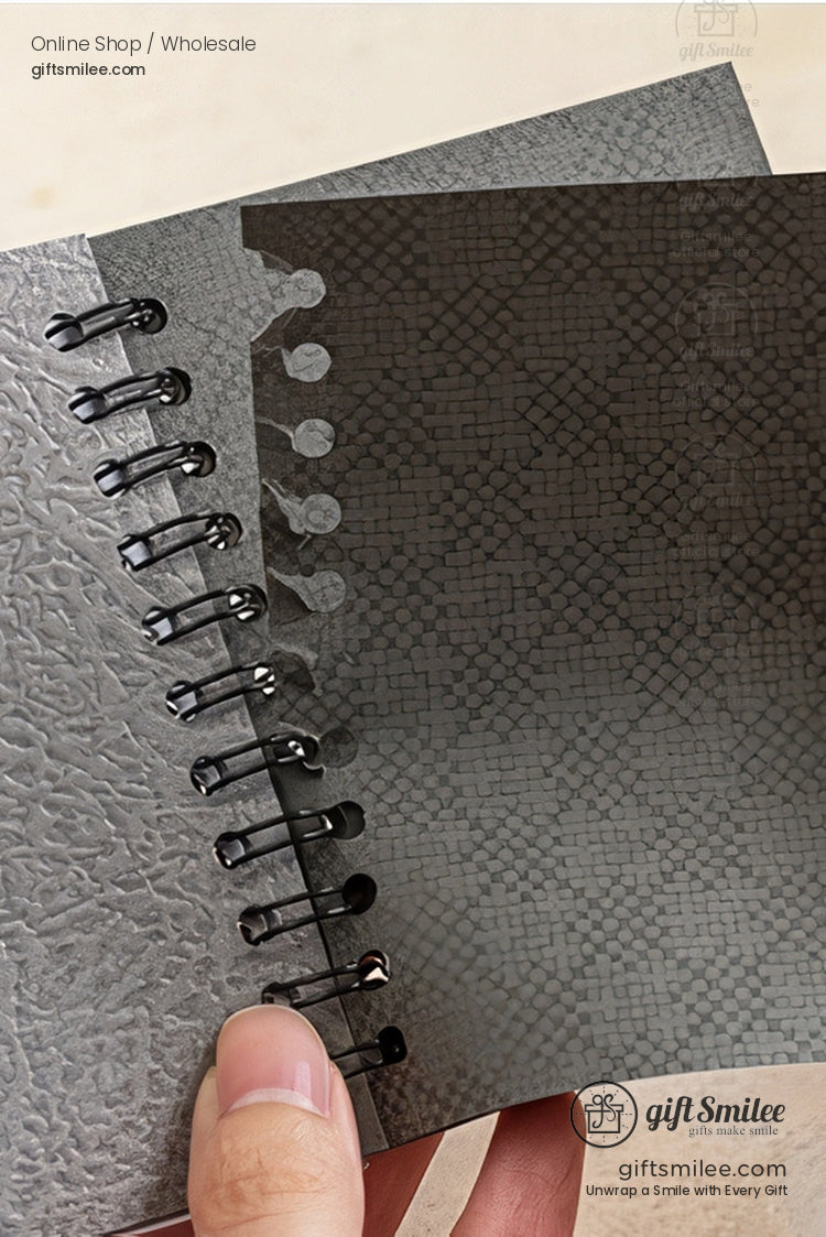 Textured black spiral notebook with embossed crocodile pattern cover, held in hand – Giftsmilee stationery for wholesale/shop.