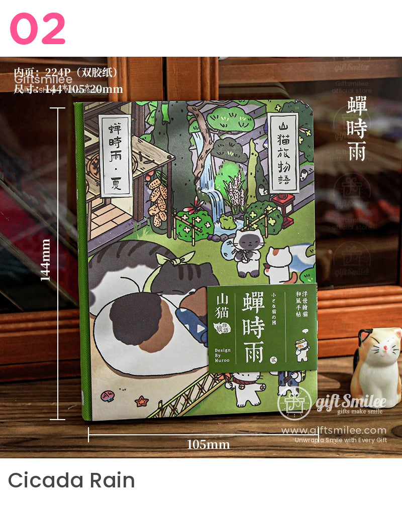 Illustrated hardcover notebook with cats green binding whimsical outdoor scene 144x105mm dimensions