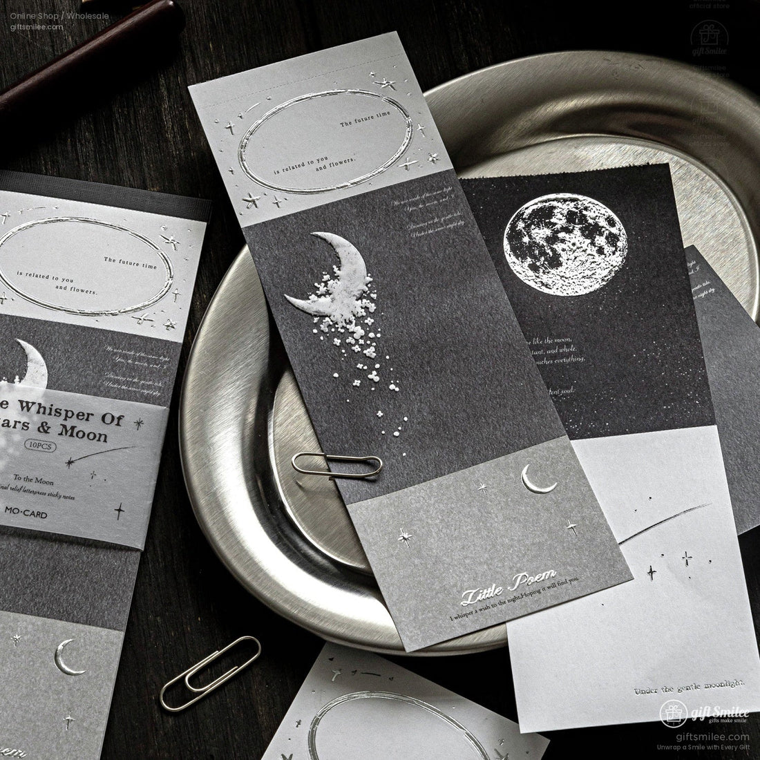 Moon-themed stationery set with postcards, notecards, and stickers in blue, gray, and green tones featuring lunar and floral designs for scrapbooking or journaling.